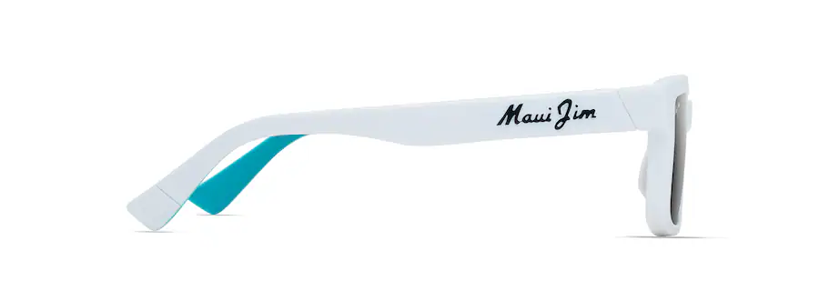 Side profile view of white sunglasses with "Maui Jim" written on the temple. The inside of the temple is blue, showcasing a stylish blend that feels like an auto draft straight from a fashion magazine.