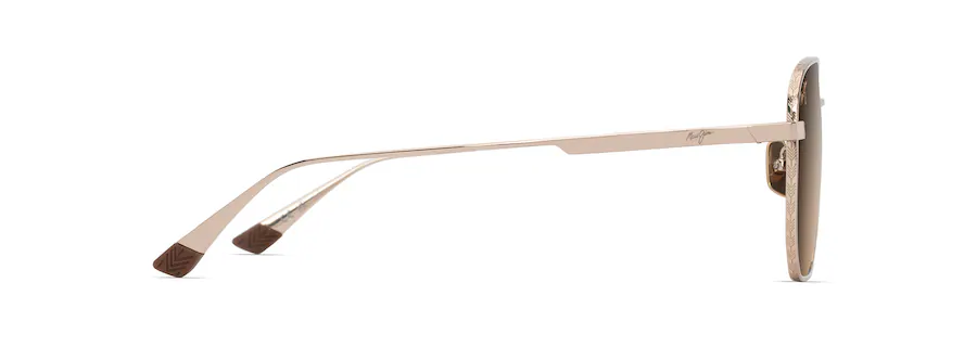 Side view of gold-framed sunglasses with thin arms and dark lenses.